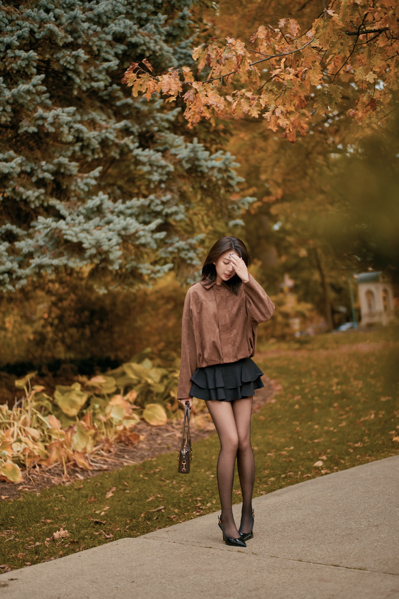 An autumn portrait among golden leaves